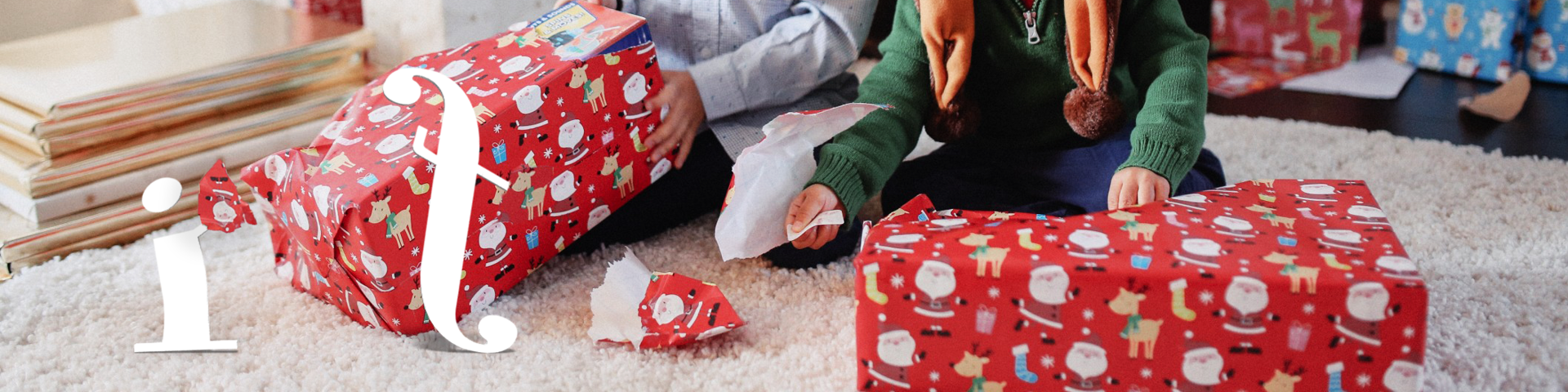 tow cute kids opening Christmas presents