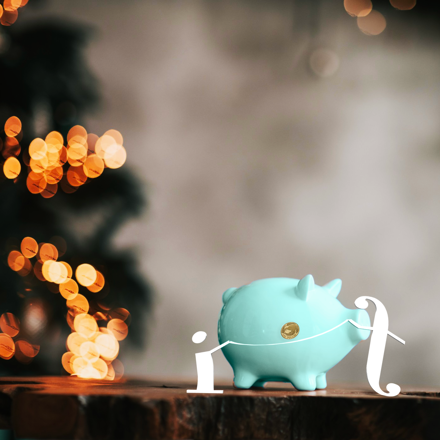 Teal piggy bank with the Instant Finance “i” and “f” characters, in front of Christmas lights