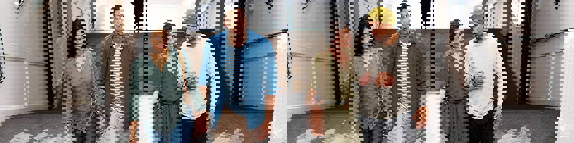 Instant Finance Refer a Friend. Four people walking up stairs