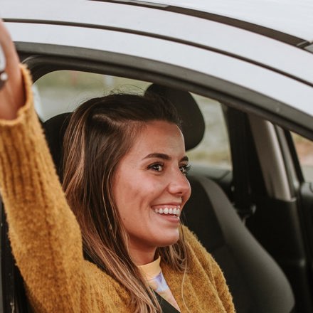 Instant Finance Personal Loans. Woman Holding Car Keys. Personalised Interest Rates